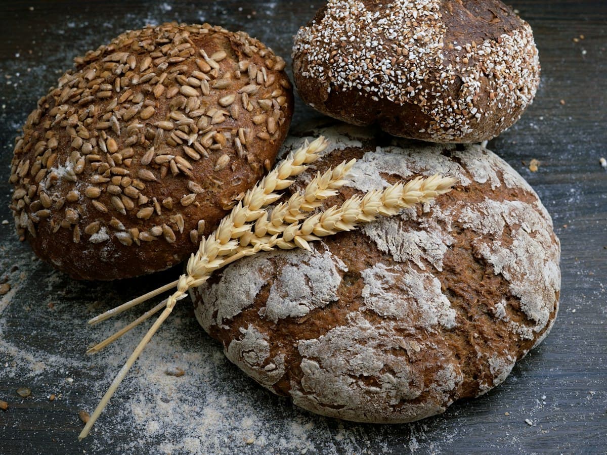 Fresh loaves of bread dusted with flour