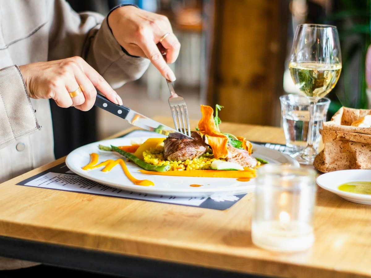 Plated restaurant dish being served